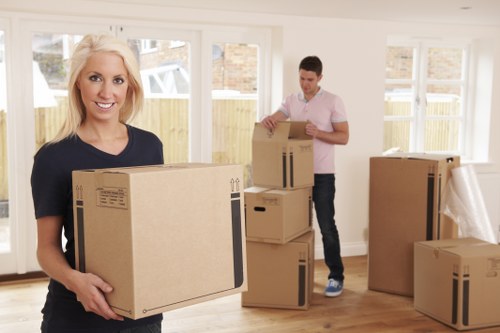 Removal team preparing for a house move in Newbury Park street setting
