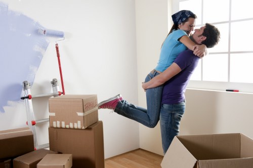 Local movers handling furniture in a Newbury Park residential street
