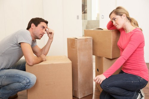 Packed office boxes and labeled items ready for business relocation