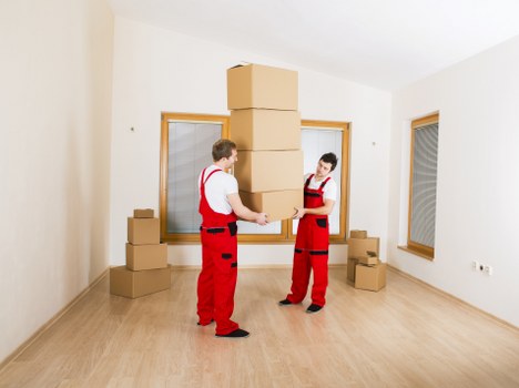 Packed moving boxes and household items ready for transport
