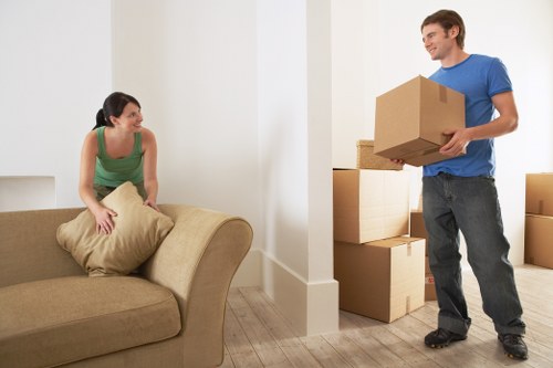 Boxes, furniture, and moving equipment ready for a Newbury Park house removal